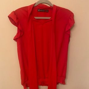 Red v neck blouse with tie